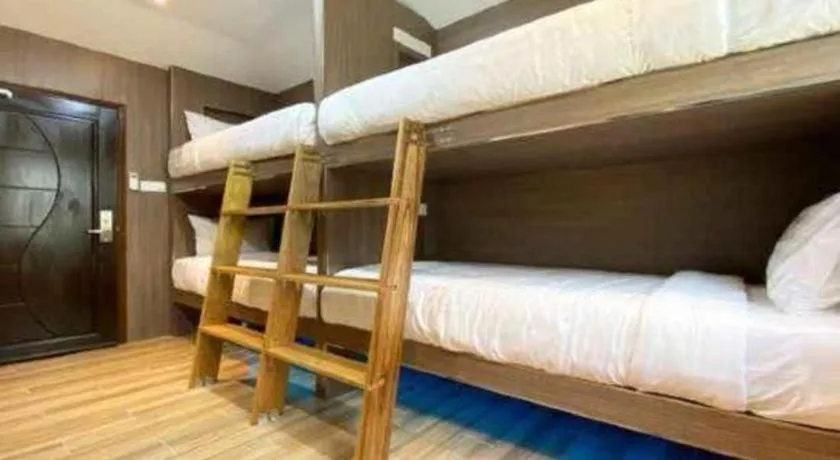 Bed in OYO 90262 Kota Kinabalu Homestay, Villa & Suite Boutique