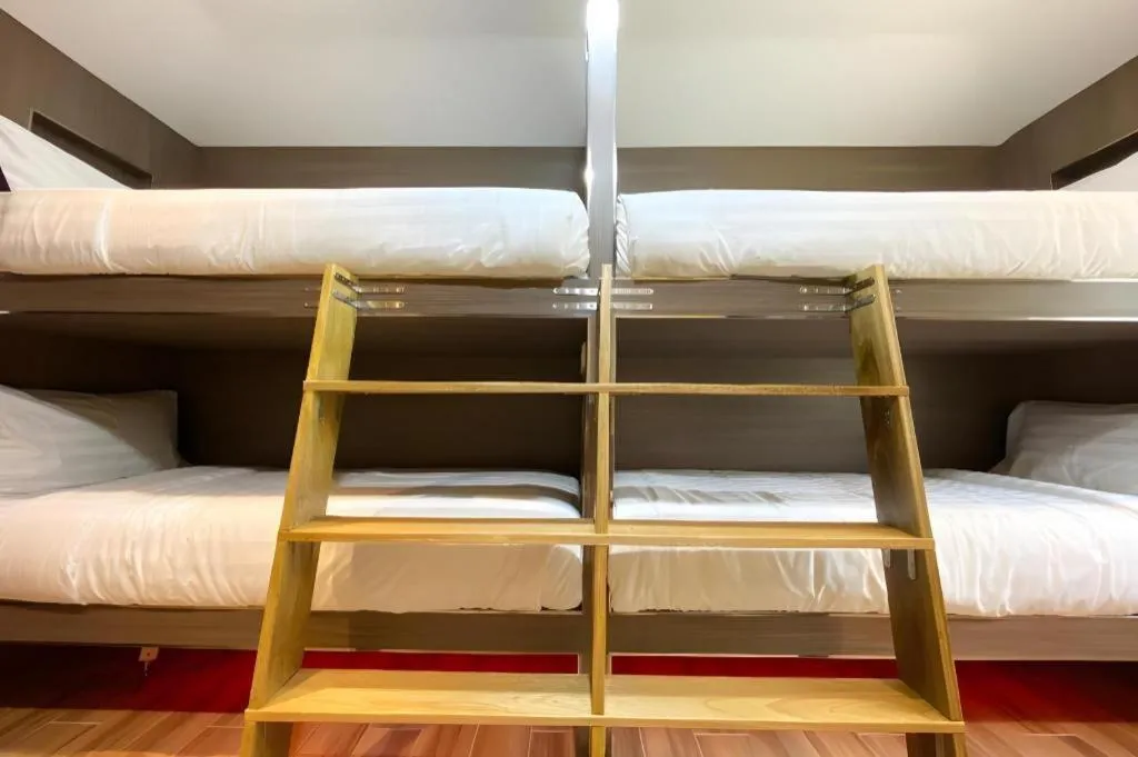 Bed in OYO 90262 Kota Kinabalu Homestay, Villa & Suite Boutique