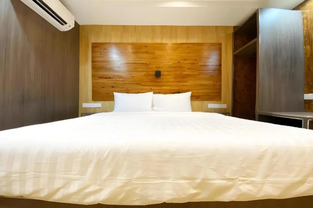 Bed in OYO 90262 Kota Kinabalu Homestay, Villa & Suite Boutique