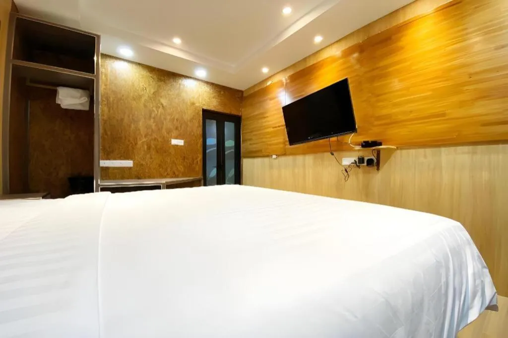 Bed in OYO 90262 Kota Kinabalu Homestay, Villa & Suite Boutique