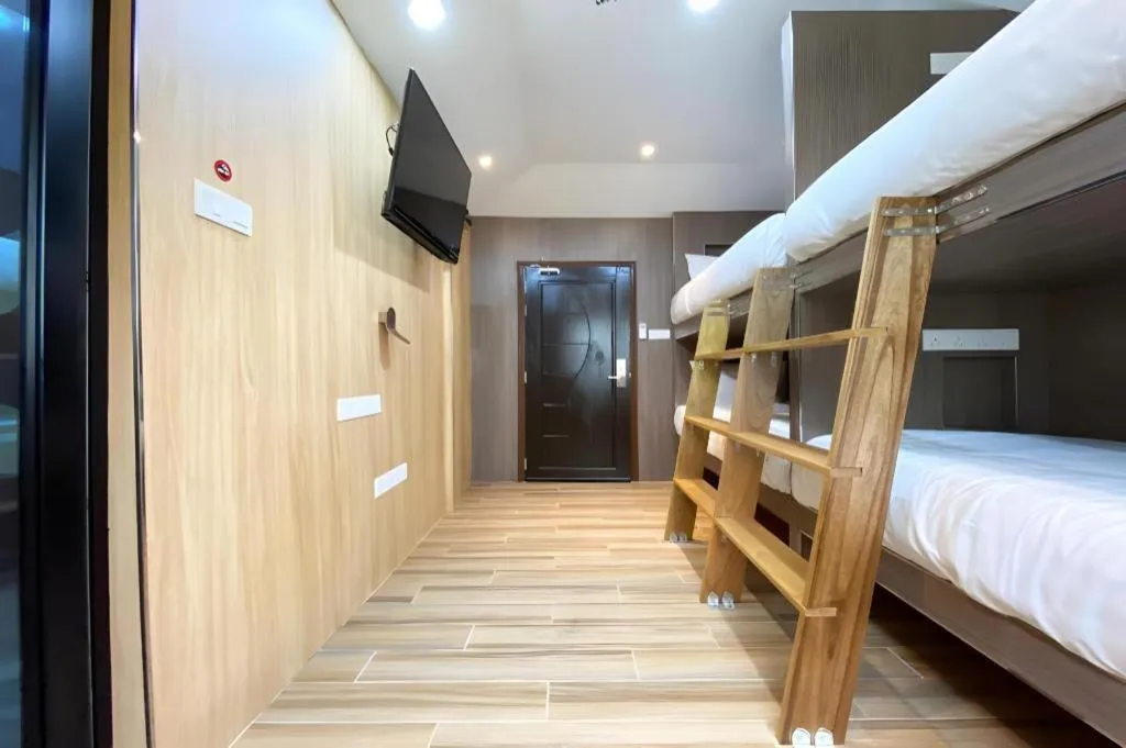 Bed in OYO 90262 Kota Kinabalu Homestay, Villa & Suite Boutique