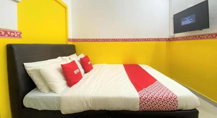 Bed in OYO 90176 D'cruz Sunrise Villa