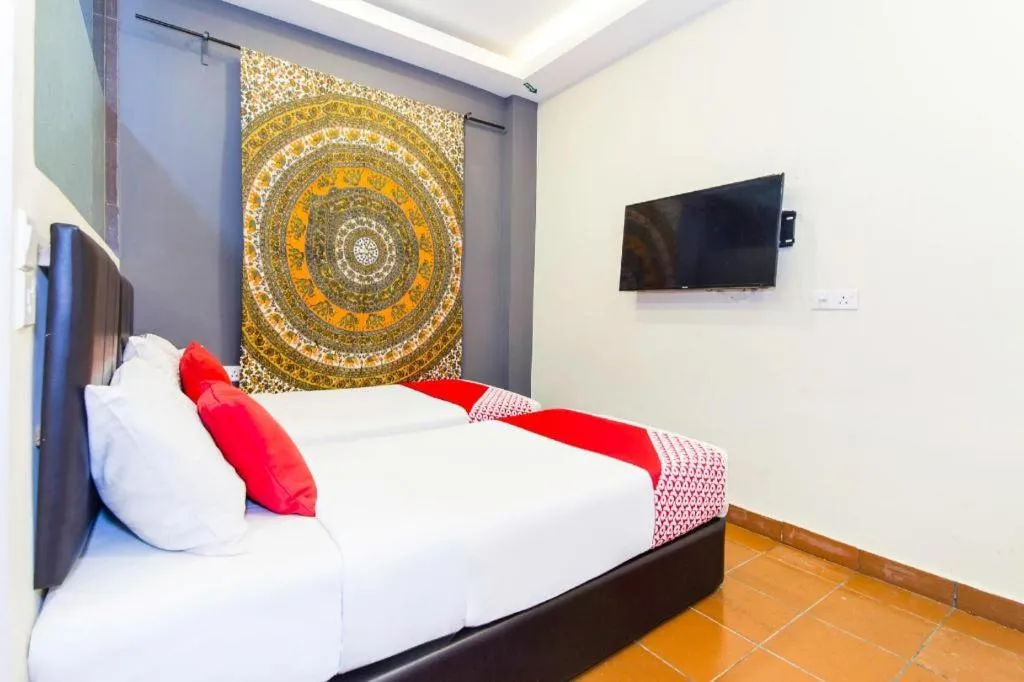 Bed in OYO 90429 Hotel Narasindo