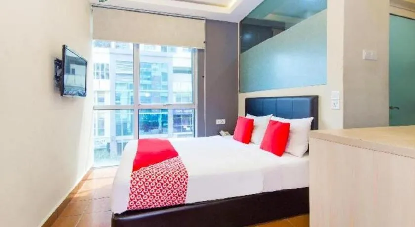 Bed in OYO 90429 Hotel Narasindo