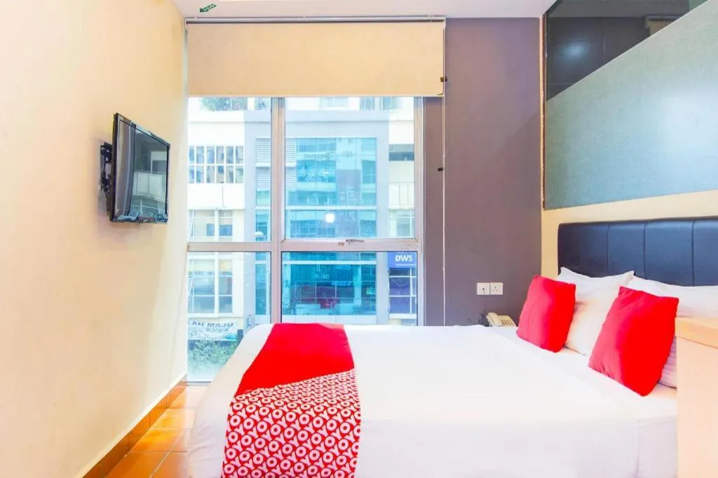 Bed in OYO 90429 Hotel Narasindo