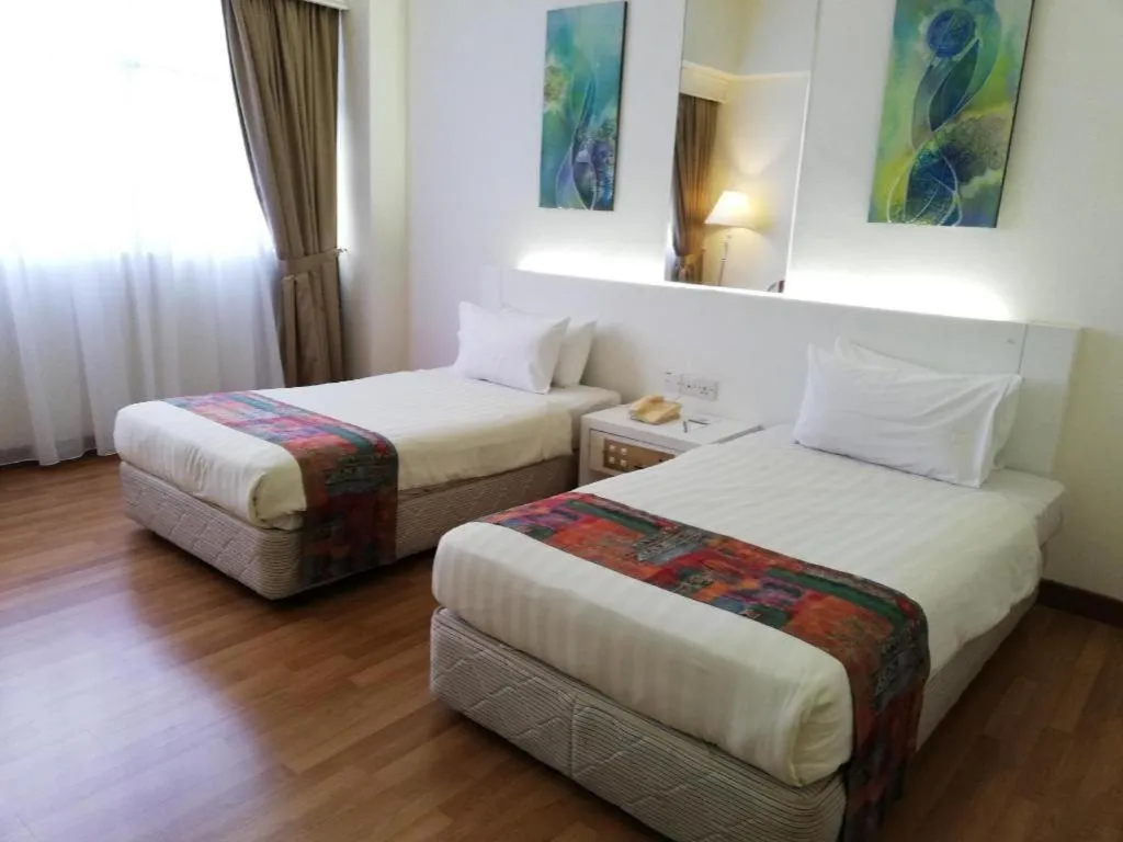 Bed in Grand Barakah Hotel