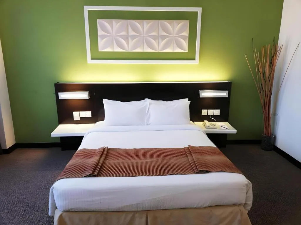 Bed in Grand Barakah Hotel