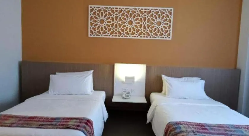 Bed in Grand Barakah Hotel