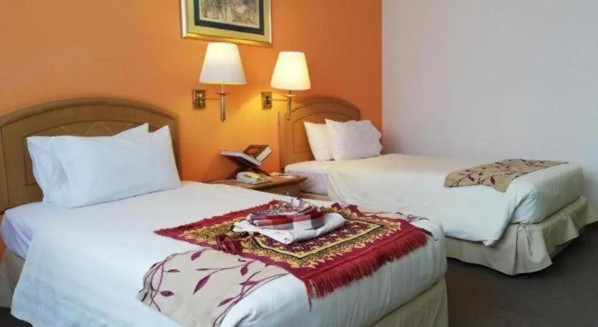 Bed in Grand Barakah Hotel