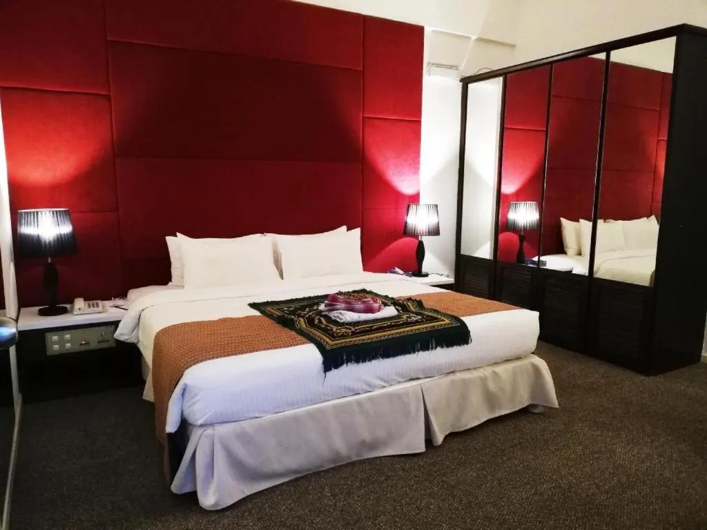 Bed in Grand Barakah Hotel