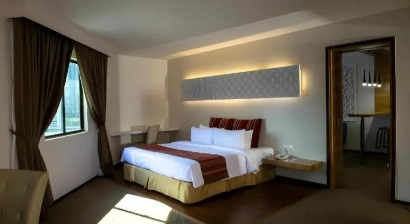 Bed in Grand Barakah Hotel