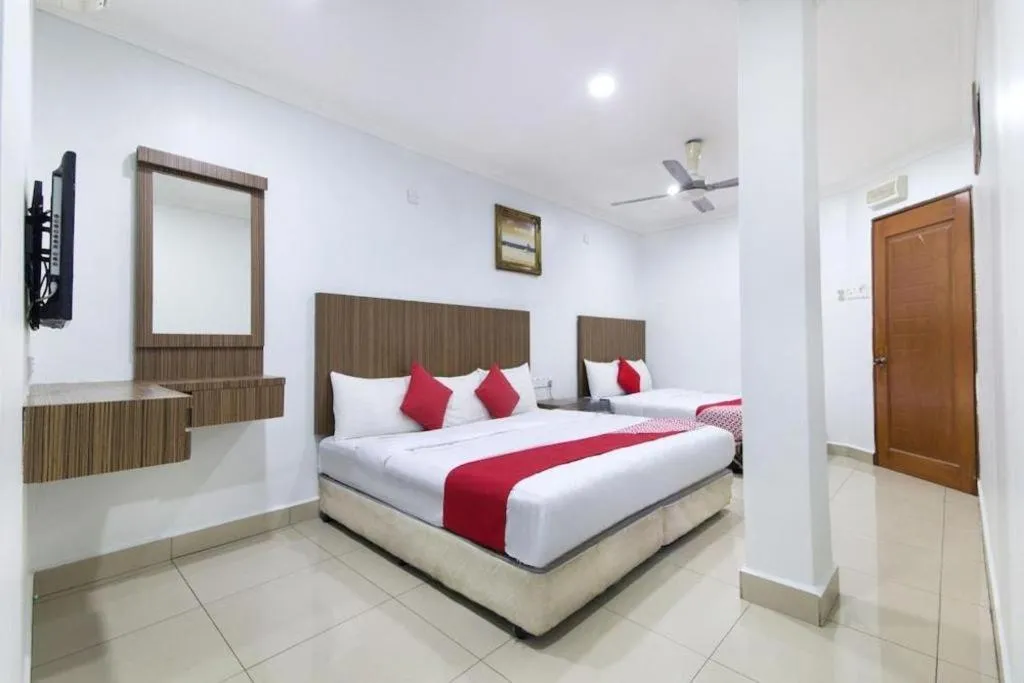 Bed in OYO 90623 Thank Q Inn 3