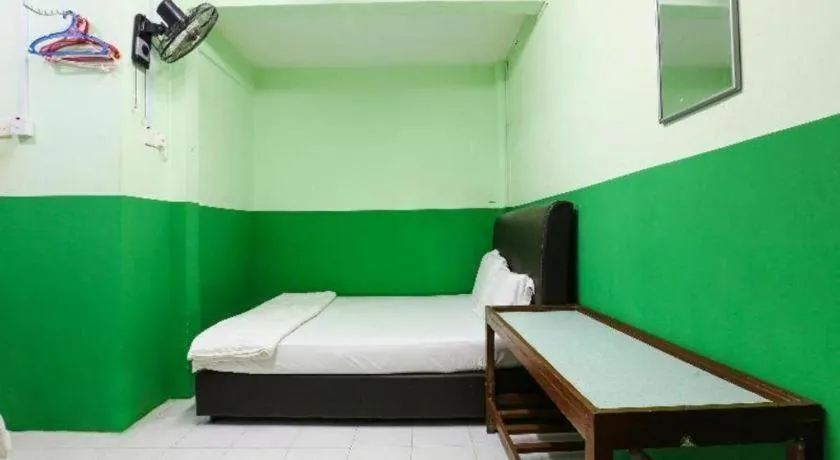 Bed in OYO 90623 Thank Q Inn 3