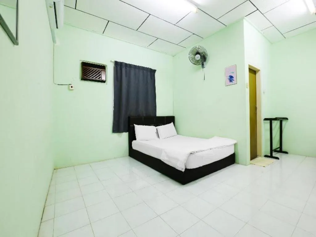 Bed in OYO 90623 Thank Q Inn 3