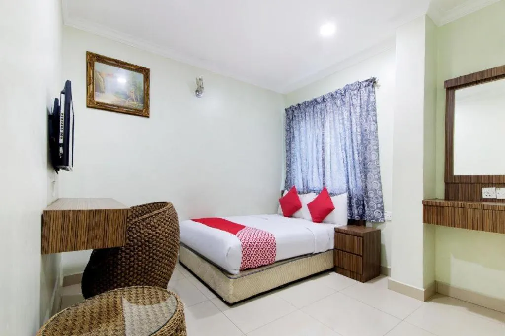 Bed in OYO 90623 Thank Q Inn 3