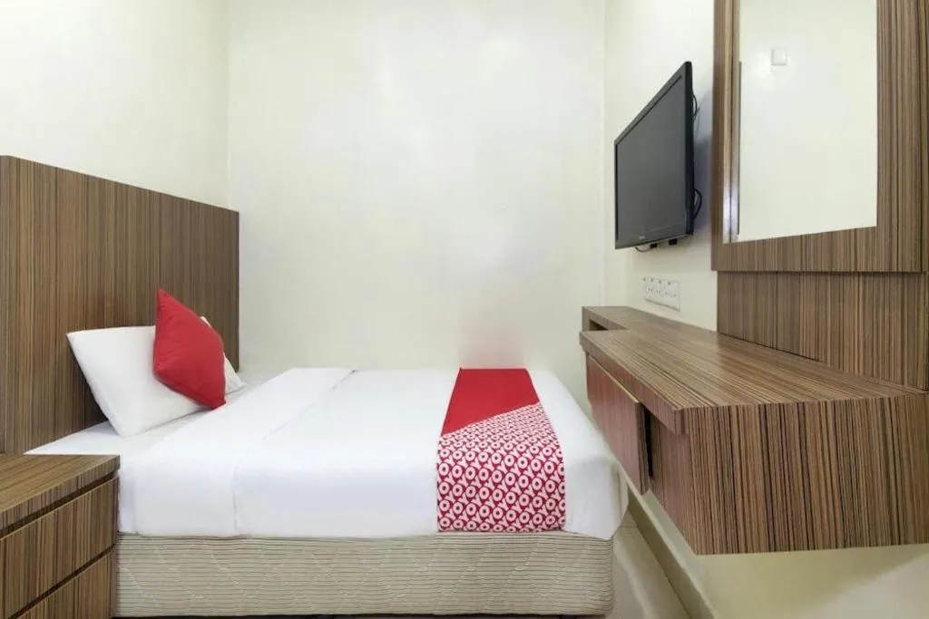 Bed in OYO 90623 Thank Q Inn 3