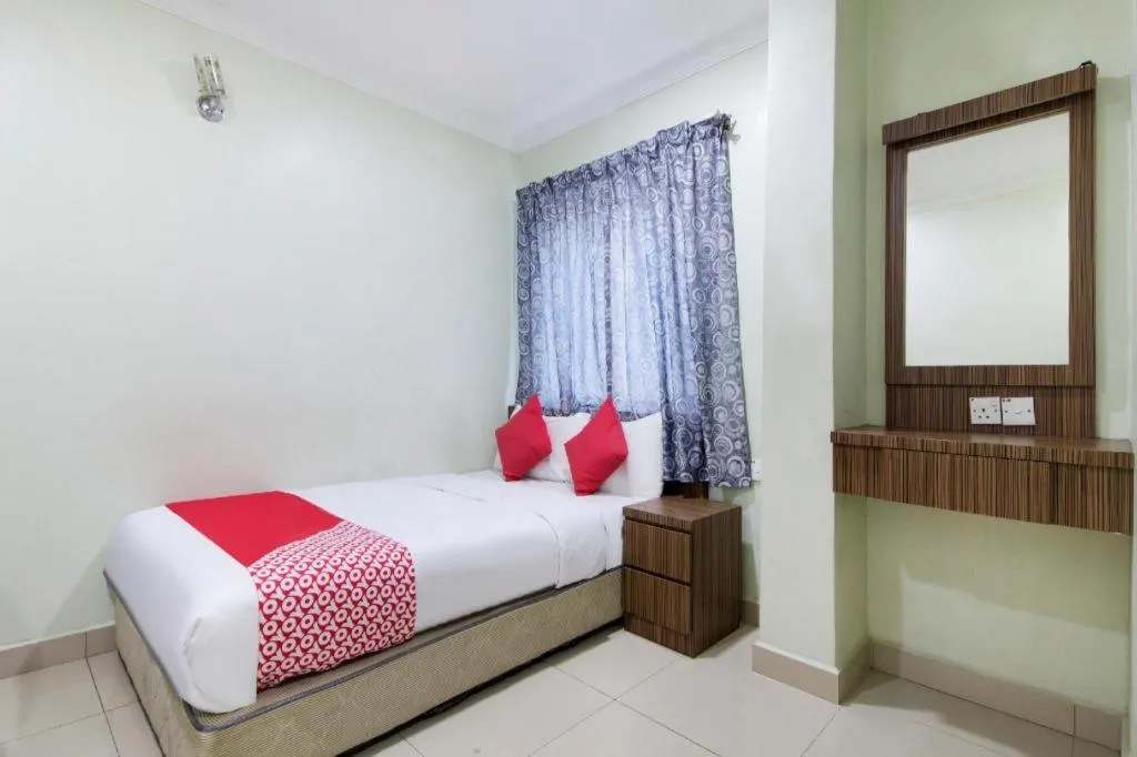 Bed in OYO 90623 Thank Q Inn 3