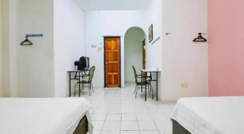 Bed in OYO 90623 Thank Q Inn 3