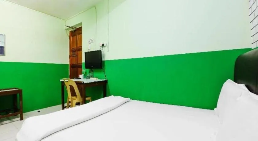 Bed in OYO 90623 Thank Q Inn 3