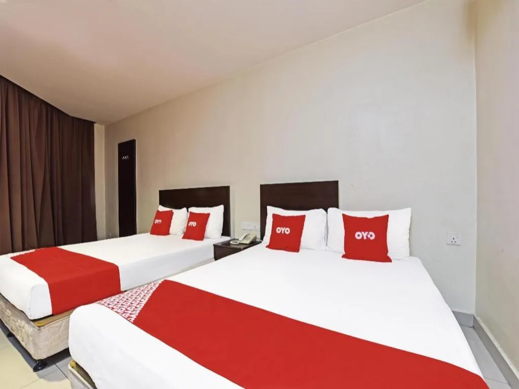 Bed in OYO 90669 My Hotel Vistana