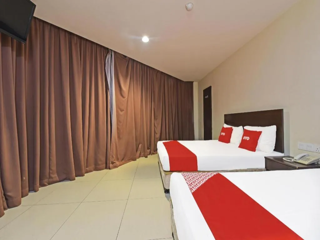 Bed in OYO 90669 My Hotel Vistana