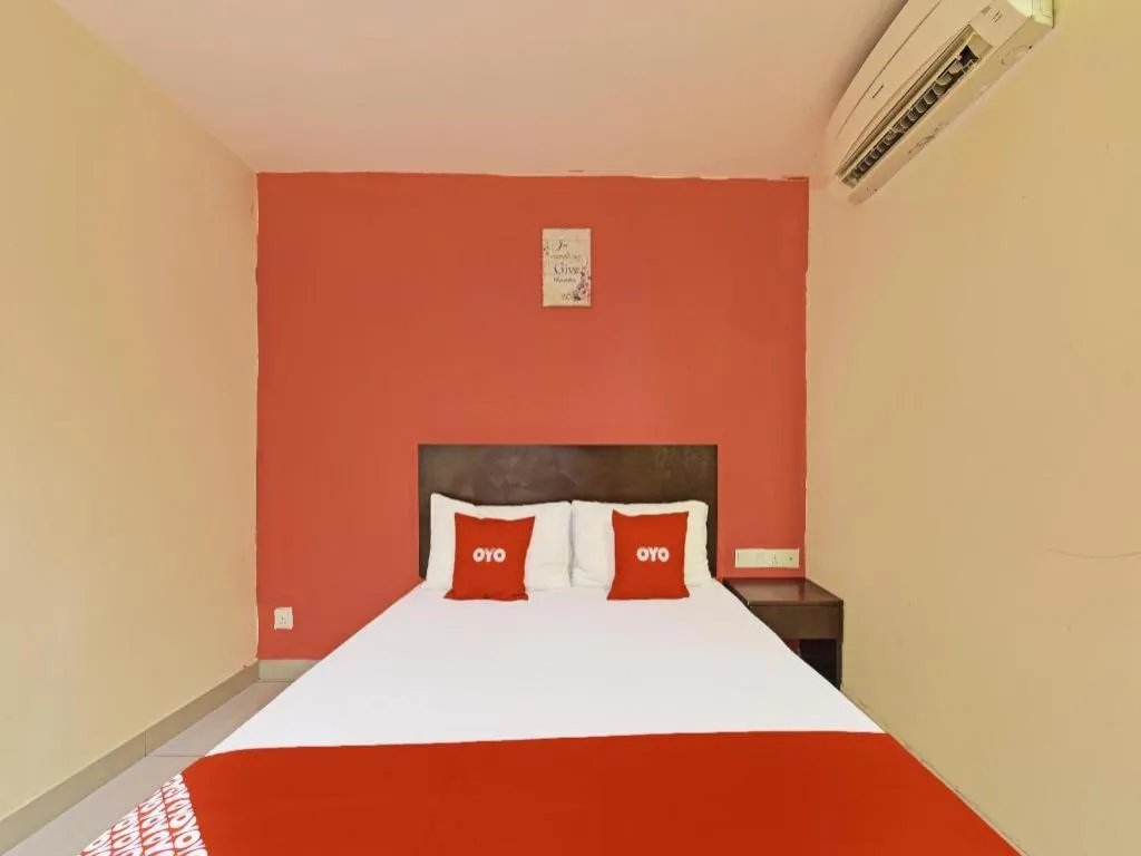 Bed in OYO 90669 My Hotel Vistana