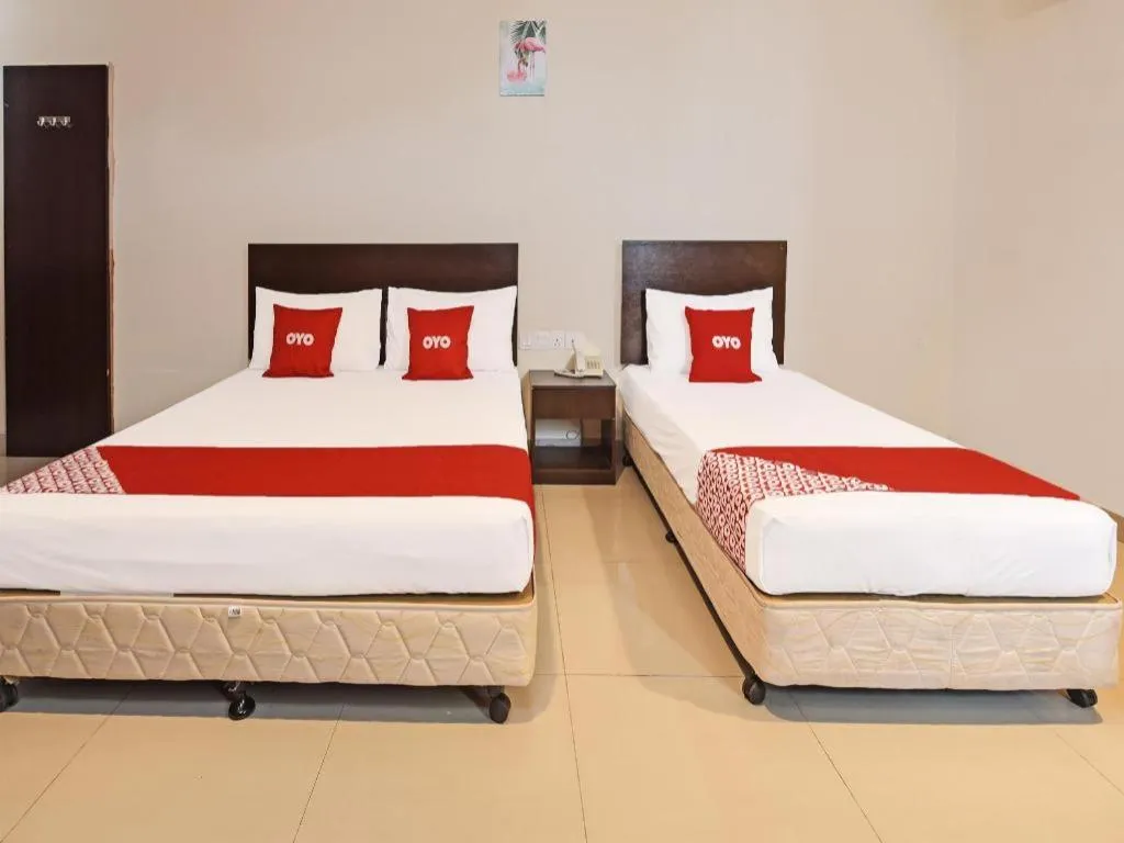 Bed in OYO 90669 My Hotel Vistana