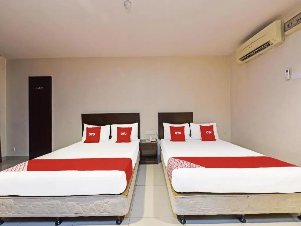 Bed in OYO 90669 My Hotel Vistana