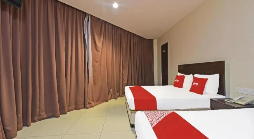 Bed in OYO 90669 My Hotel Vistana