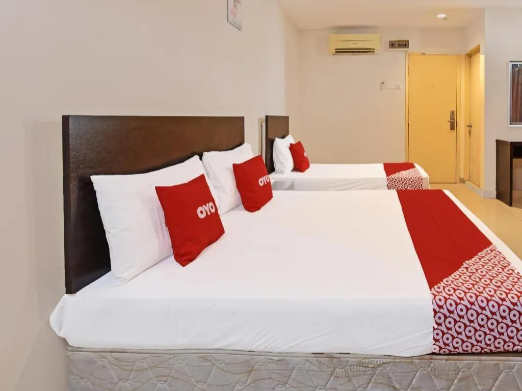 Bed in OYO 90669 My Hotel Vistana