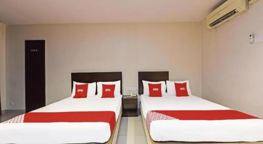 Bed in OYO 90669 My Hotel Vistana