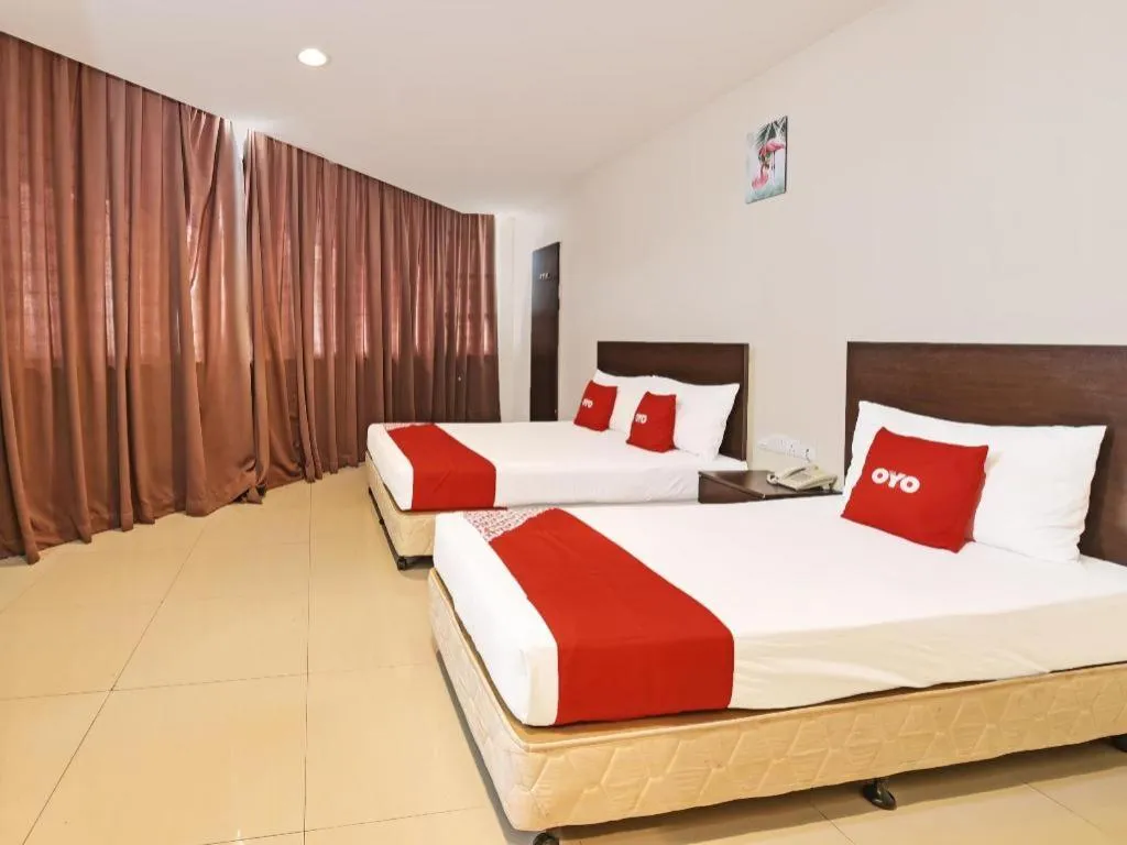 Bed in OYO 90669 My Hotel Vistana