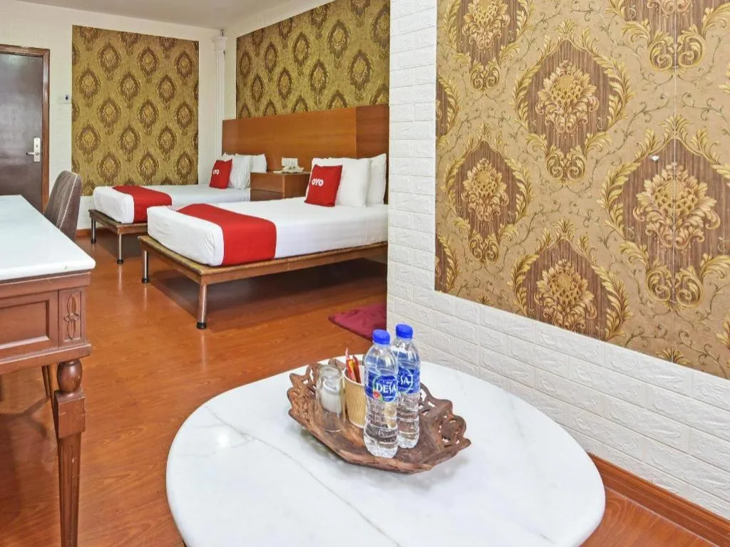 Bed in Capital O 90661 Luxor Empire Hotel