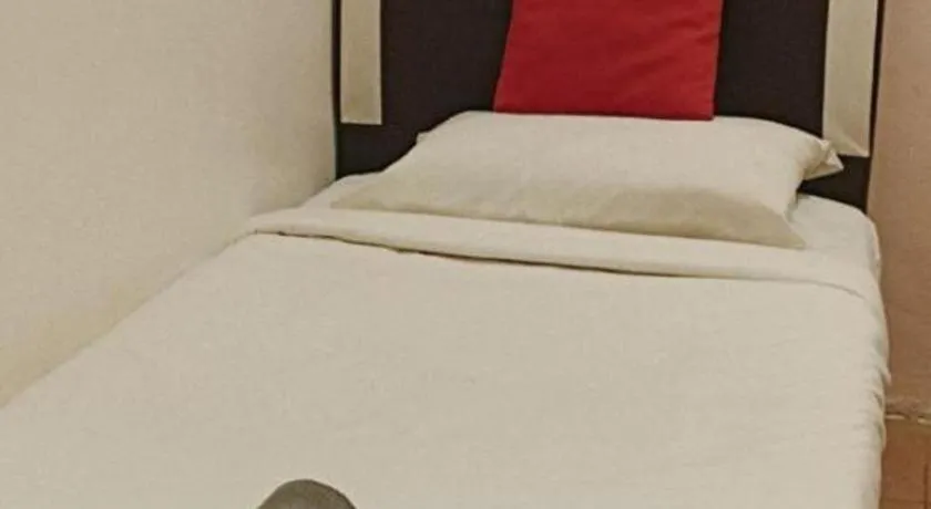 Bed in The Hotel Tudor Inn