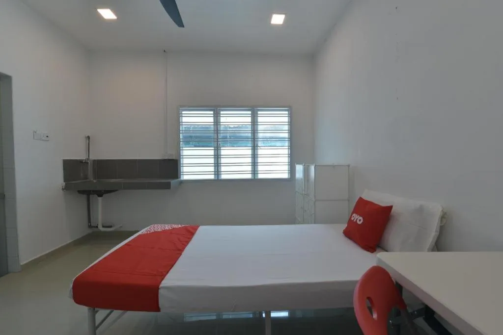 Bed in OYO 90889 Narasindo Cottage