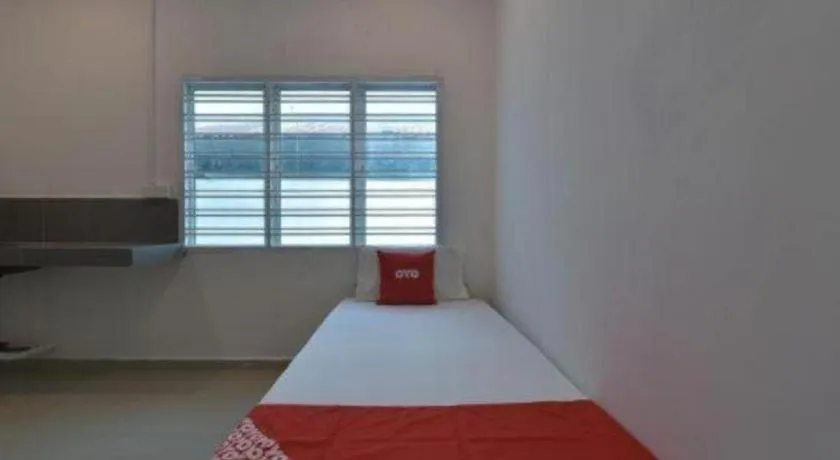 Bed in OYO 90889 Narasindo Cottage