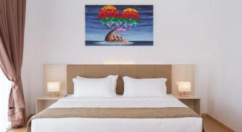 Bed in Sand Bay Resort Semporna