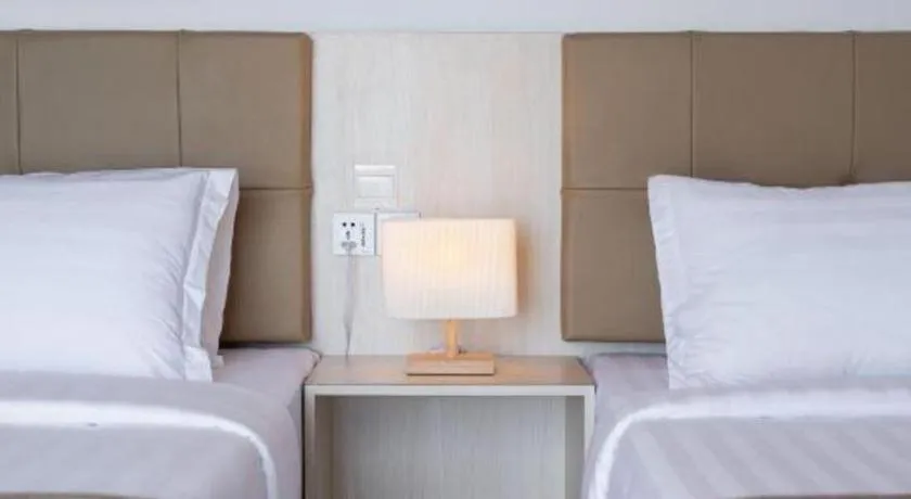 Bed in Sand Bay Resort Semporna