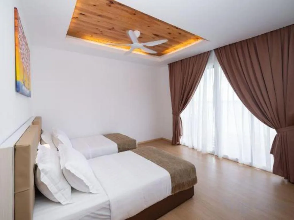 Bed in Sand Bay Resort Semporna