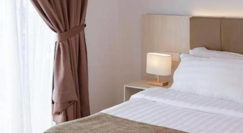 Bed in Sand Bay Resort Semporna