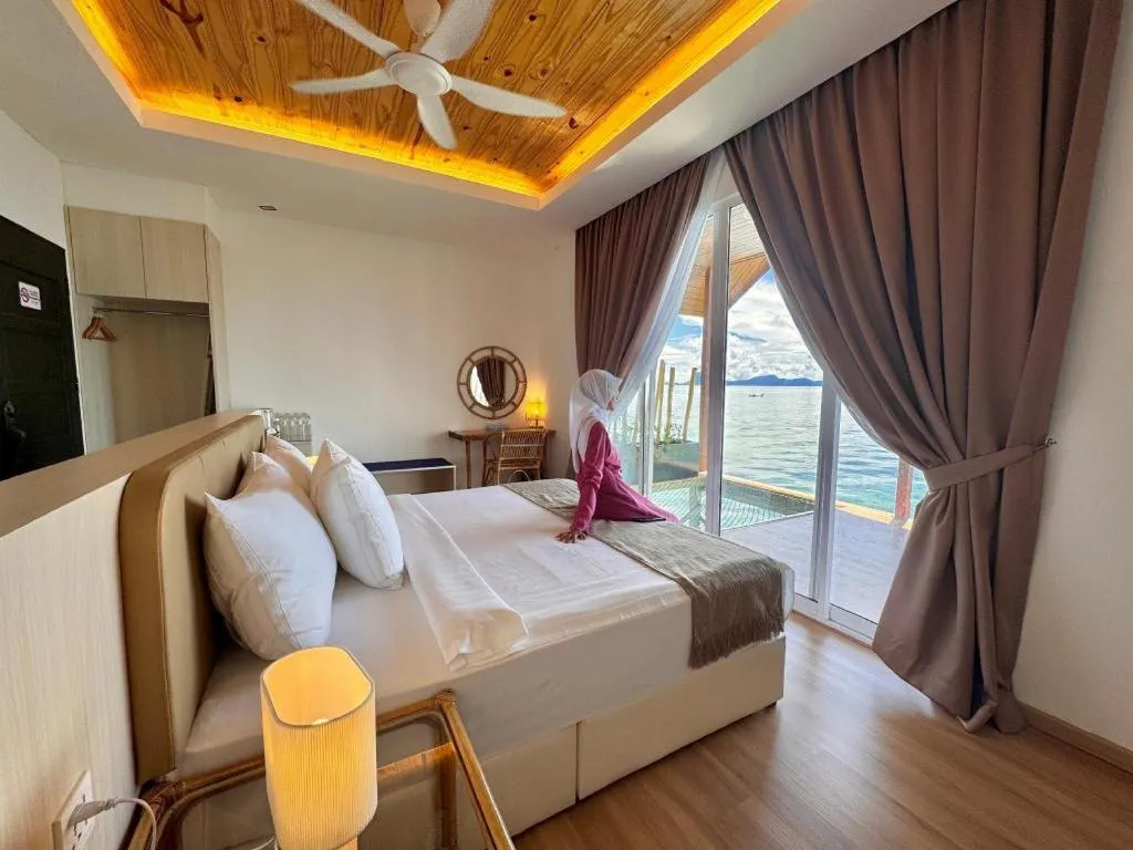 Bed in Sand Bay Resort Semporna