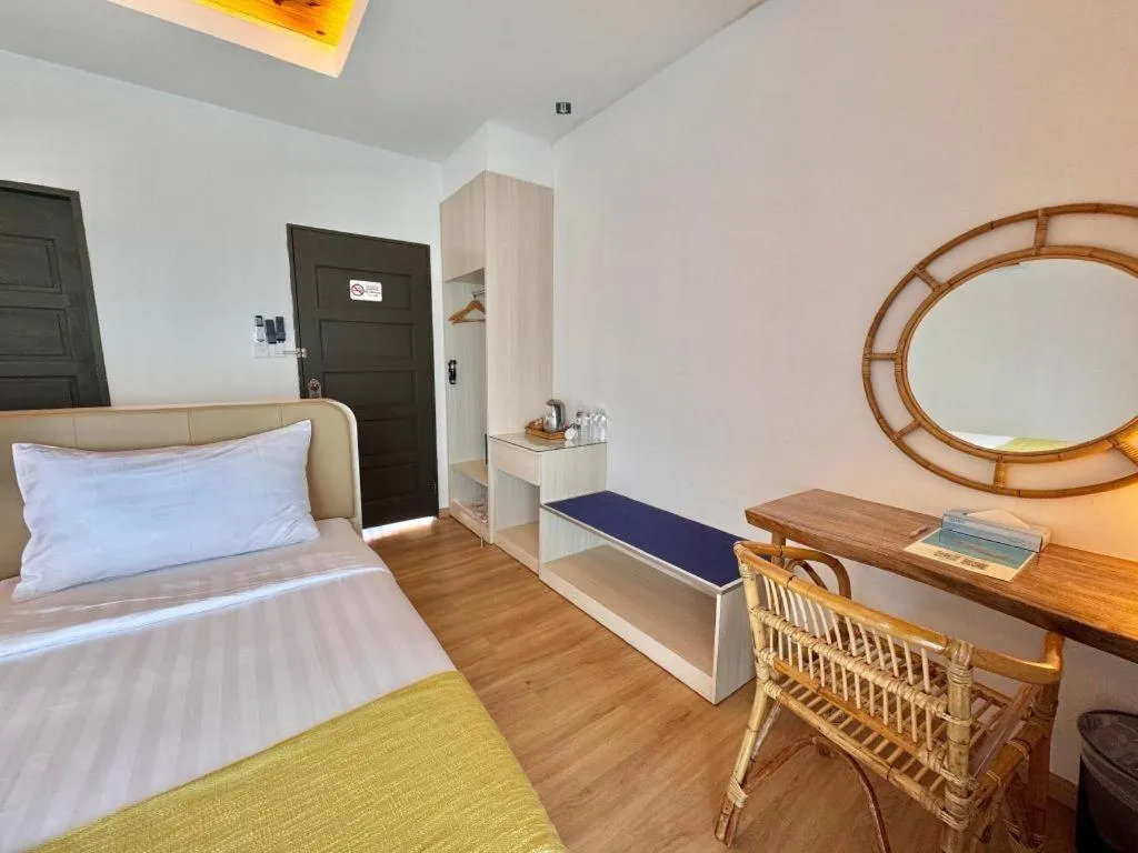 Bed in Sand Bay Resort Semporna