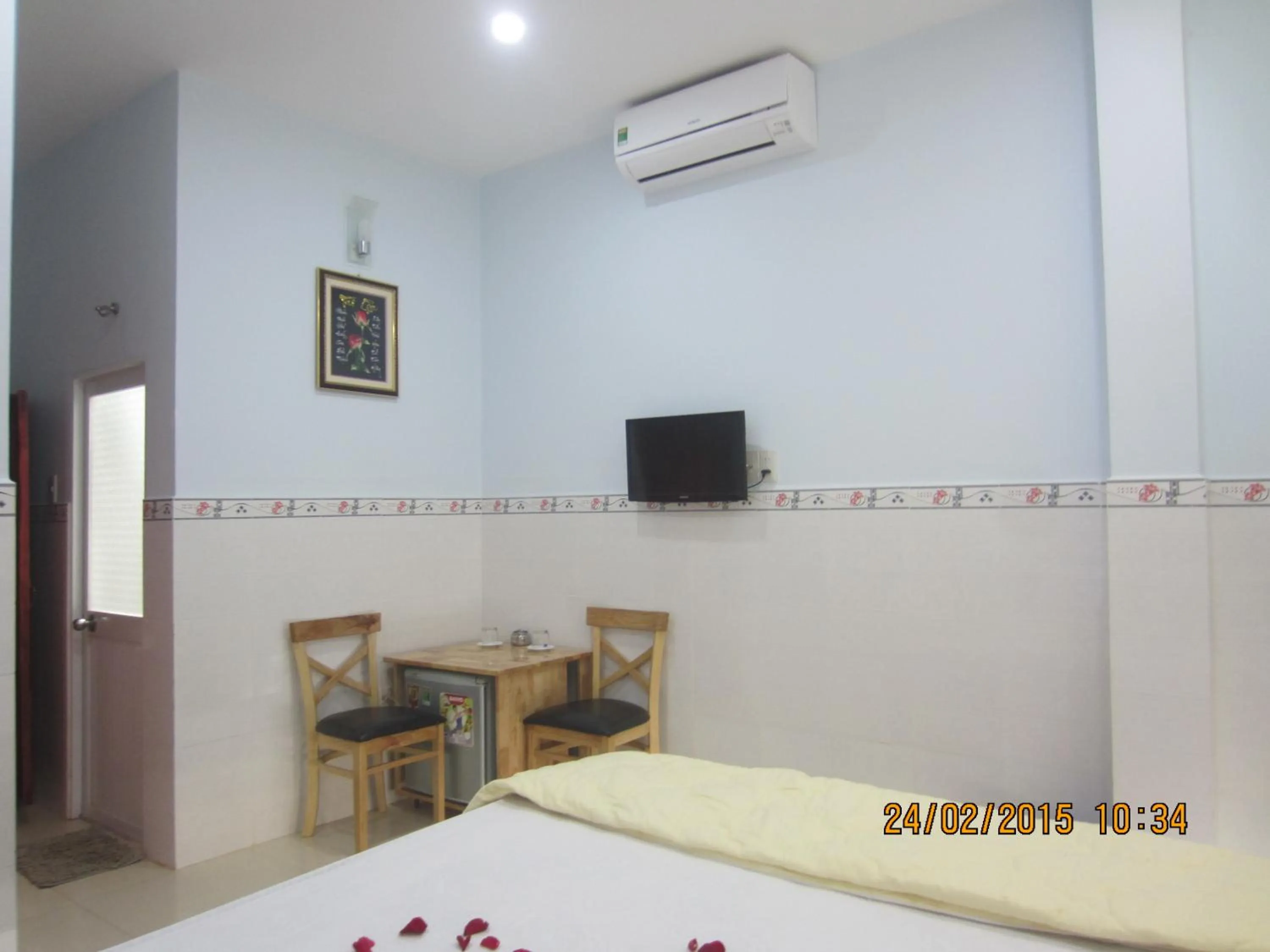 Communal lounge/ TV room in Ngan Giang Guesthouse