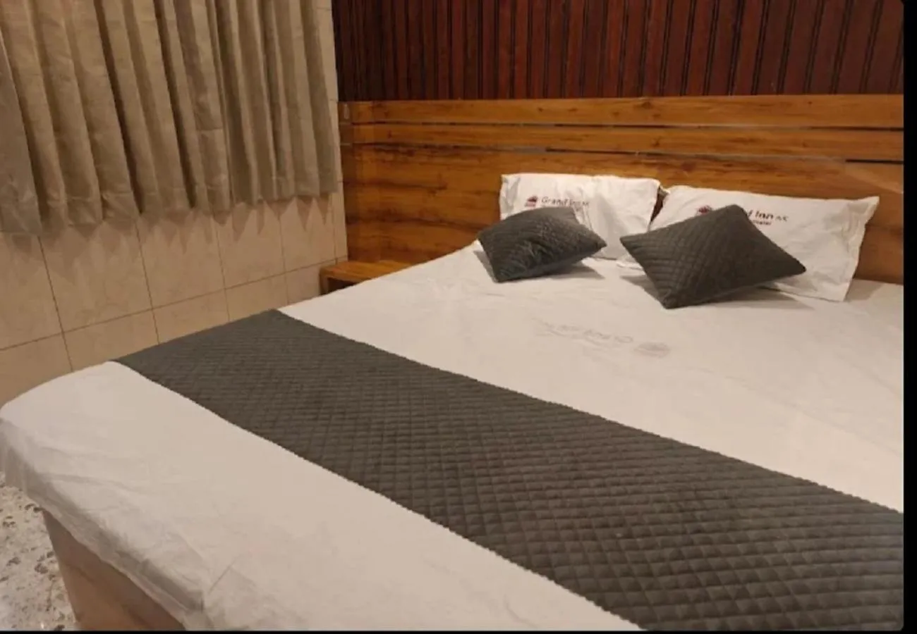 Bedroom, Bed in Grand Inn