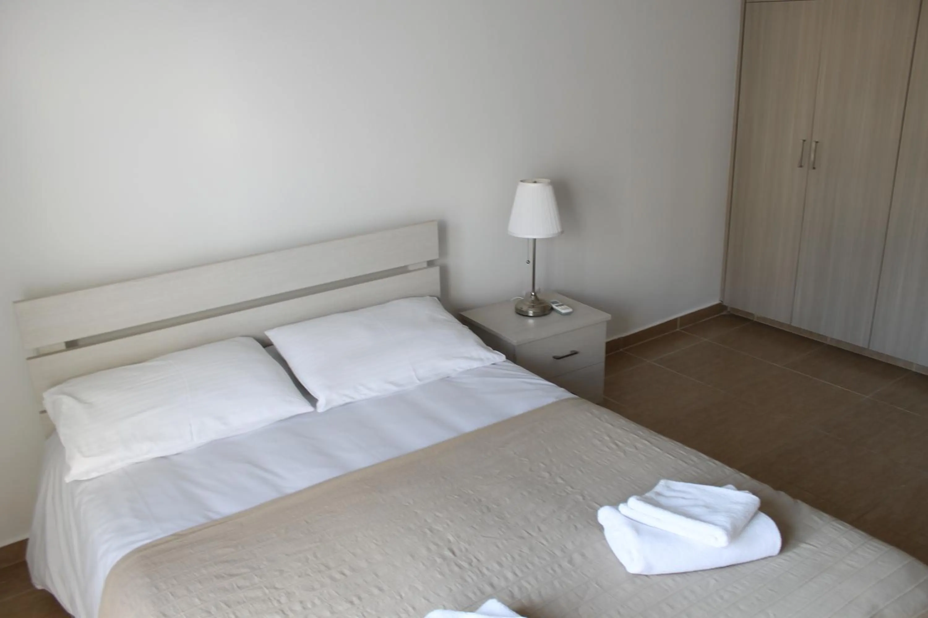 Bed in Tiffany City Apartments