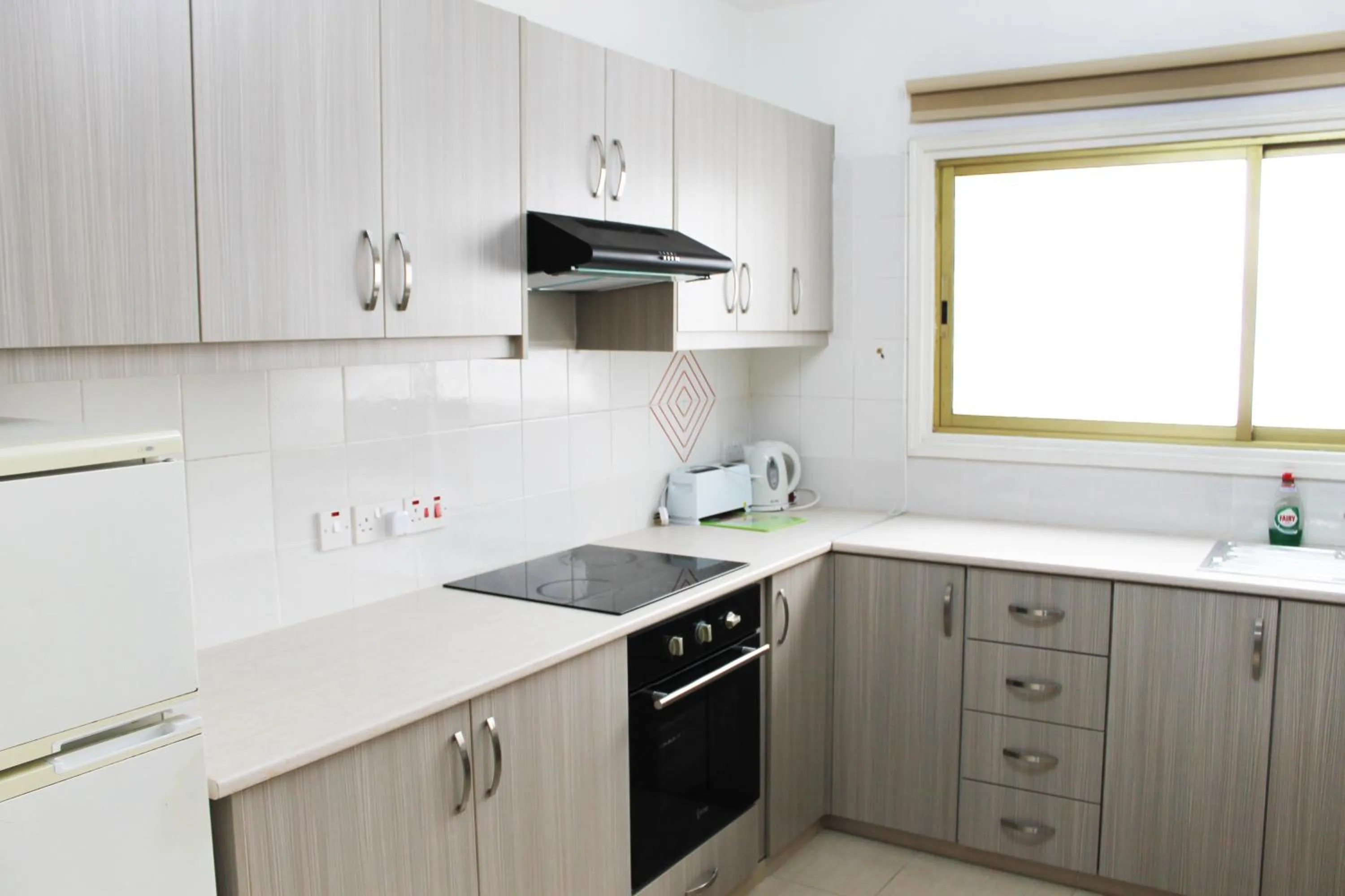Kitchen or kitchenette in Tiffany City Apartments