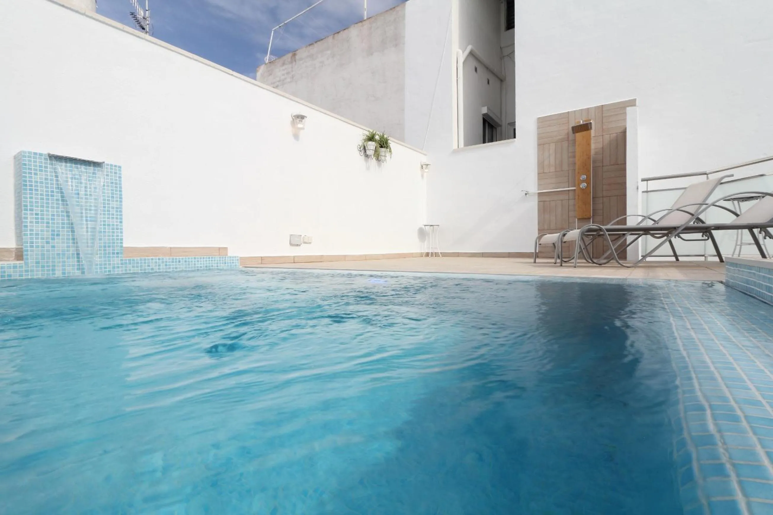 Swimming pool in Sitges Centre Mediterranean House- 5 Bedroom, 4 Bathroom, Terrace Courtyard, Private Rooptop Pool