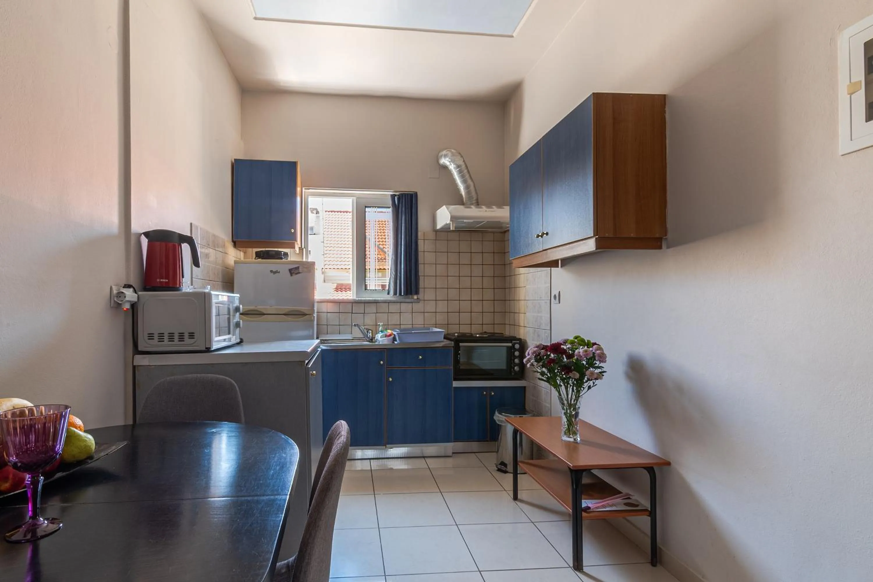 Kitchen or kitchenette in Alena Apartments