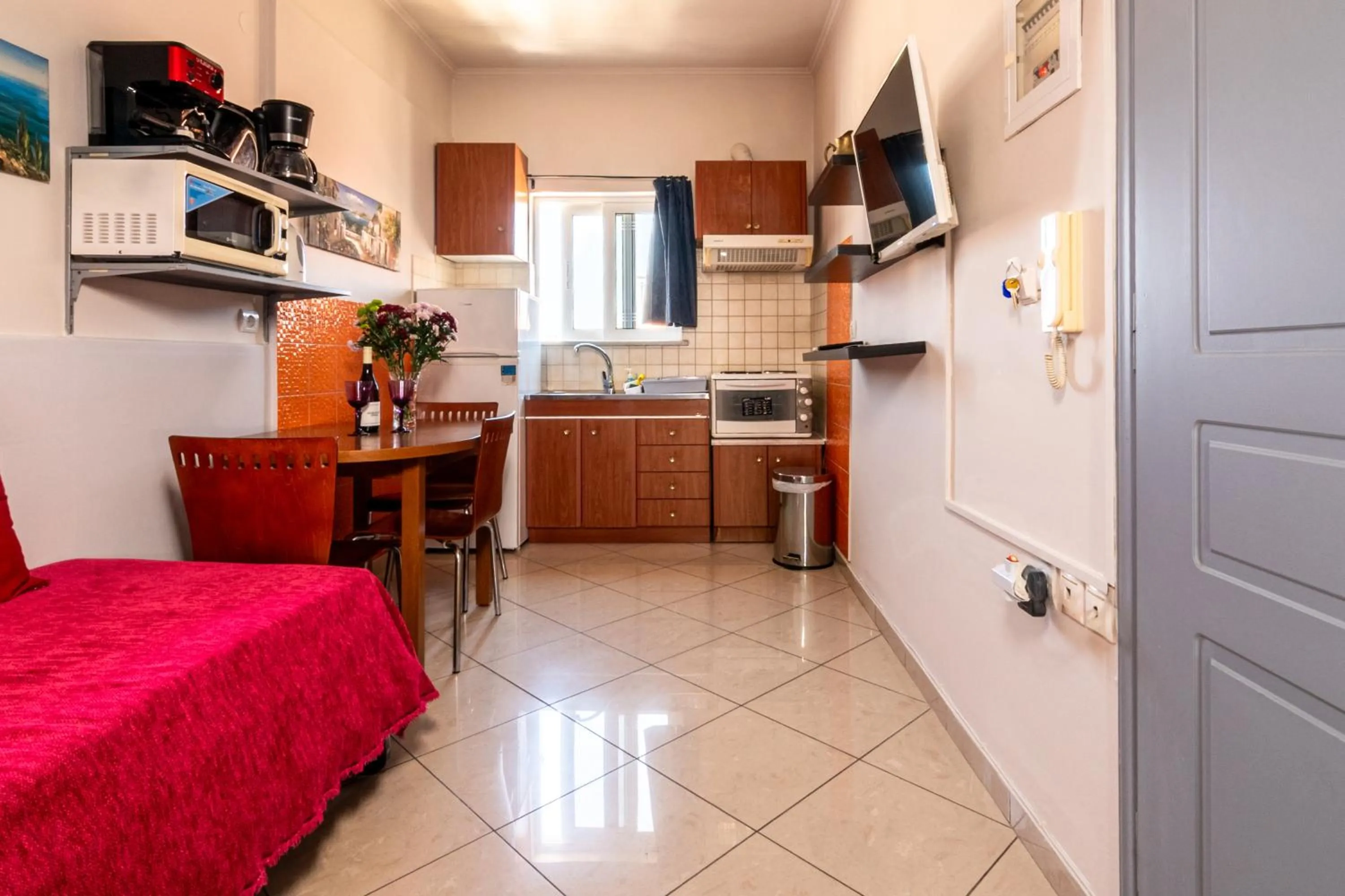 Kitchen or kitchenette in Alena Apartments
