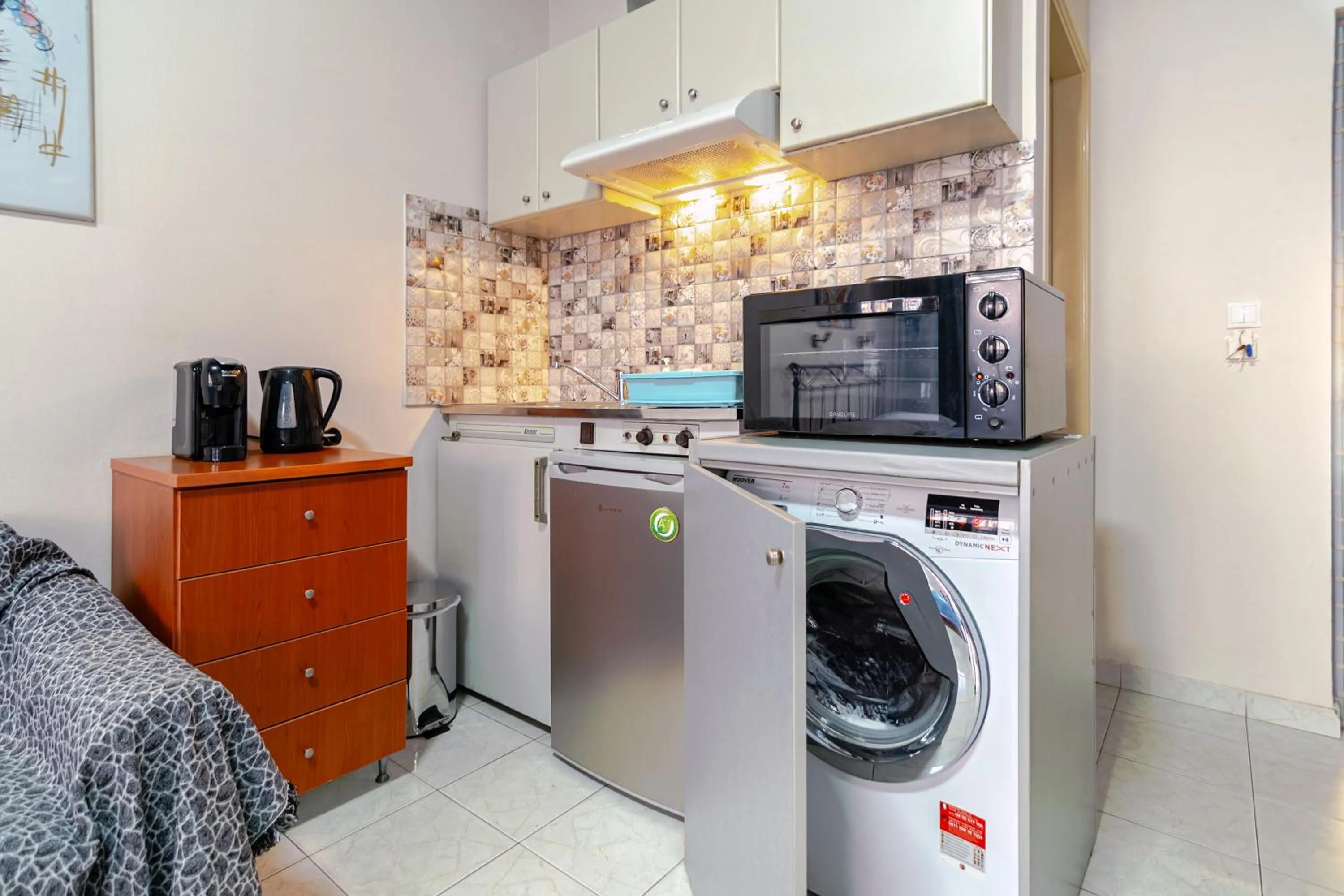 Kitchen or kitchenette in Alena Apartments